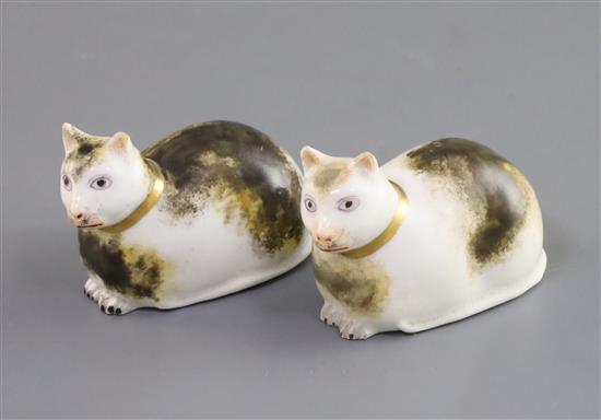 Two Derby porcelain figures of recumbent cats, c.1830, L. 6.2cm, small ear chips